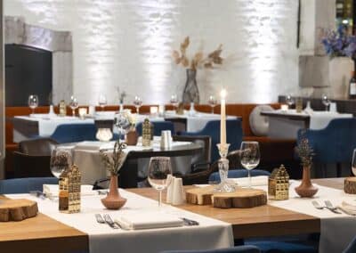 Restaurant im Bilderberg Kasteel Vaalsbroek Hotel, bekannt für seine gehobene Küche und gemütliche Atmosphäre.