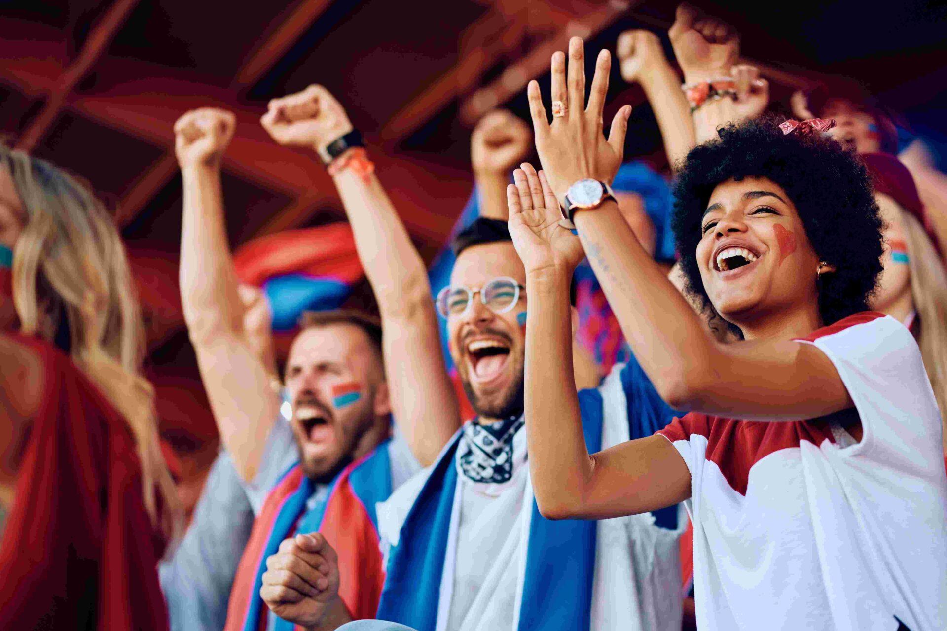 Group,Of,Cheerful,Sports,Fans,Celebrating,Victory,Of,Their,Favorite